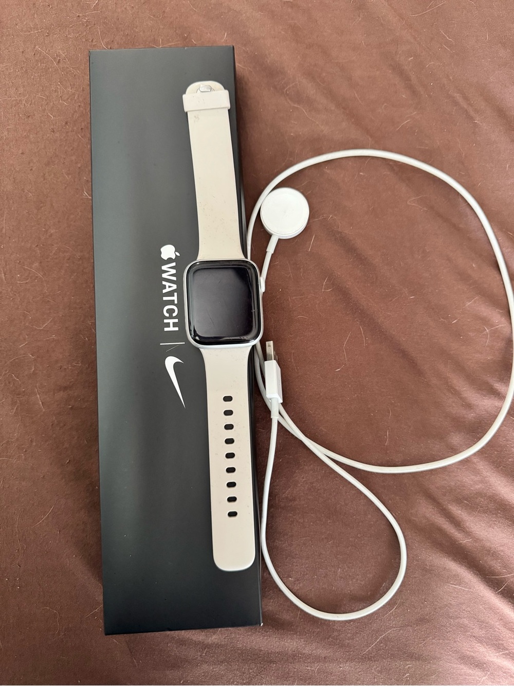 Apple Watch with Nike White Sport Band and Magnetic Charger